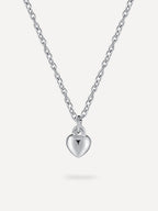 Collar con colgante de corazón de alivio