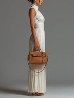 Mono en Chiffon Blanco Sin Mangas con Cremallera