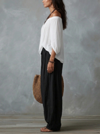 Conjunto Top Blanco Off-Shoulder y Pantalón Ancho