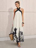 Vestido midi con estampado floral y cuello halter