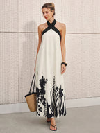 Vestido midi con estampado floral y cuello halter
