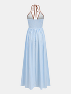 Vestido midi a rayas con escote en V profundo y cuello halter