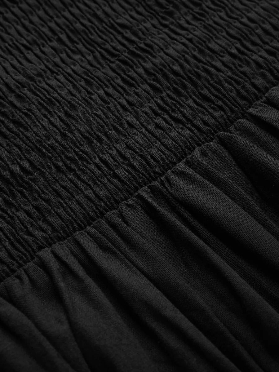 Vestido largo de algodón sin mangas con bolsillos y aberturas