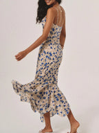 Vestido largo con estampado floral, bajo irregular y nudos