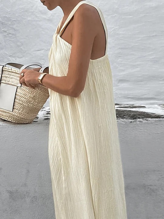 Vestido largo color crema con escote halter