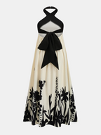 Vestido midi con estampado floral y cuello halter