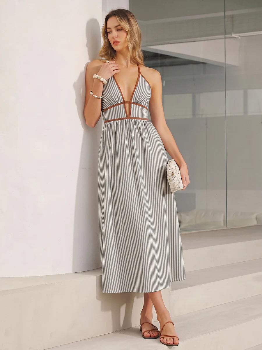 Vestido midi a rayas con escote en V profundo y cuello halter
