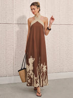 Vestido midi con estampado floral y cuello halter